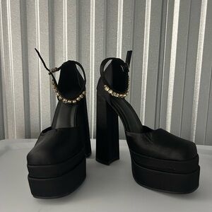 Elegant Black Platform Heels with Gold Accents